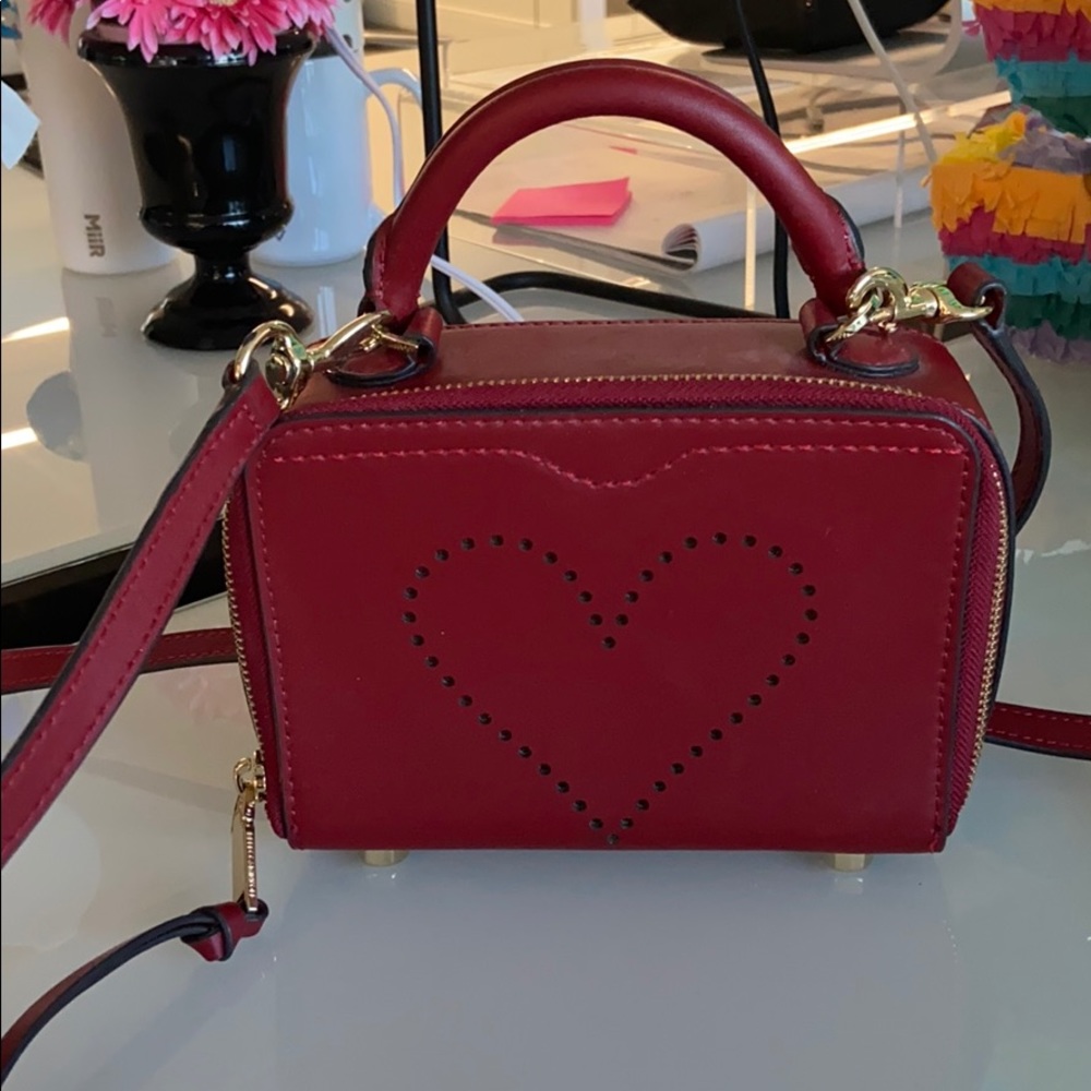 Rebecca Minkoff red bag with heat